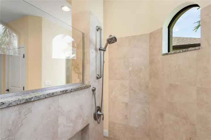 Bathroom with tiled shower