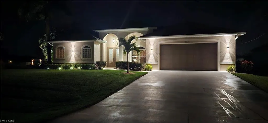 View of front of house with a yard