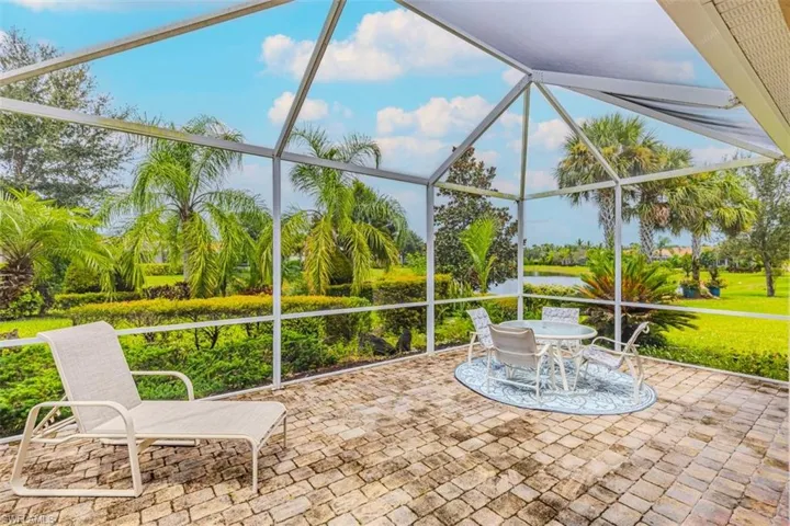 Screened in Lanai with a patio and a water view
