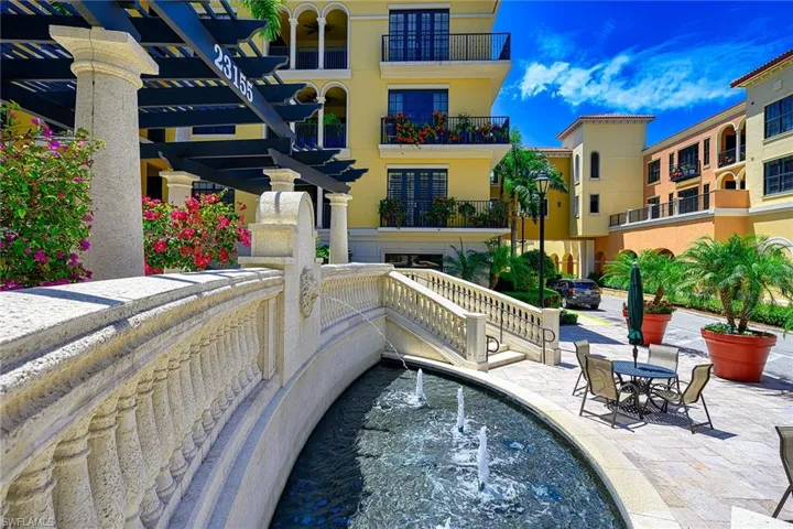 View of pool with a patio area and a pergola