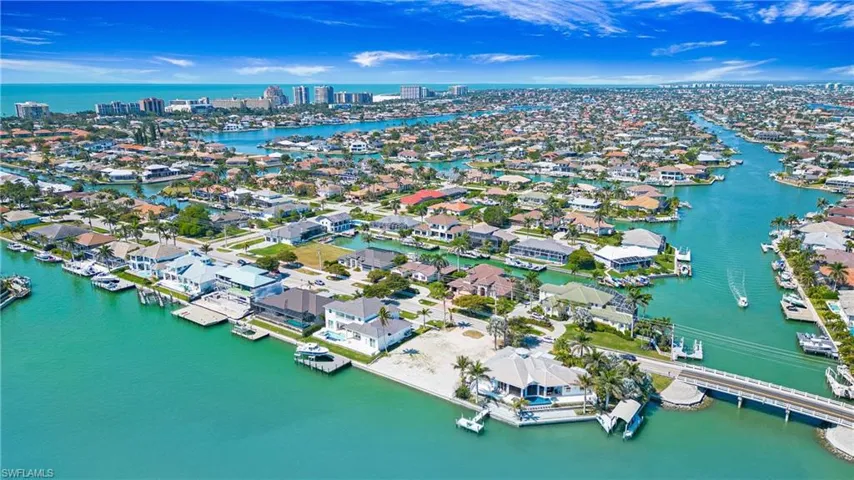 Aerial view of residential area with a nearby body of water