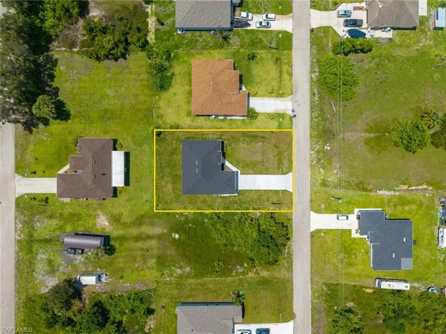 Aerial overview of property's location with property parcel outlined