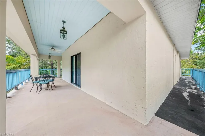 View of patio with a ceiling fan