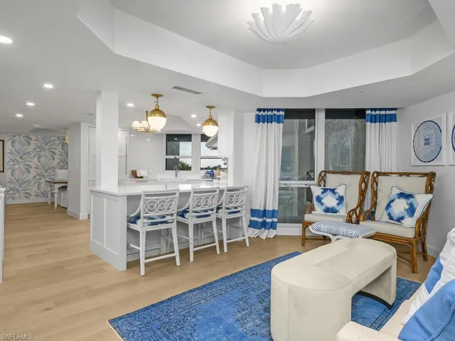 Looking to kitchen & island/breakfast bar.