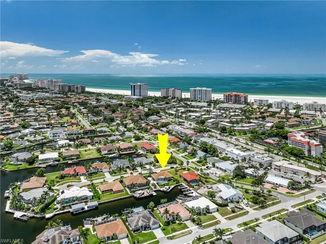 View of urban area featuring a nearby body of water and nearby suburban area