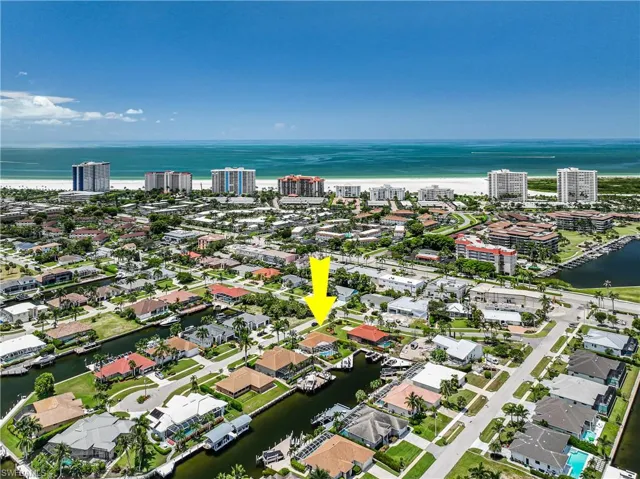 View of urban area featuring a large body of water and nearby suburban area