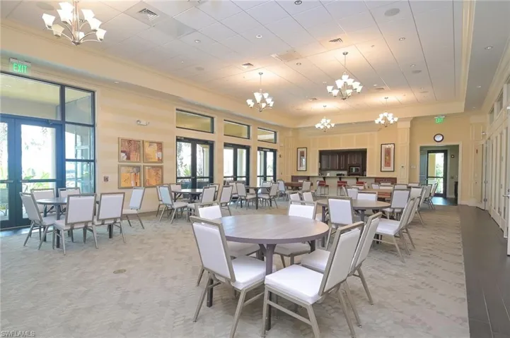 Main Club room with the pool and Screened Lanai