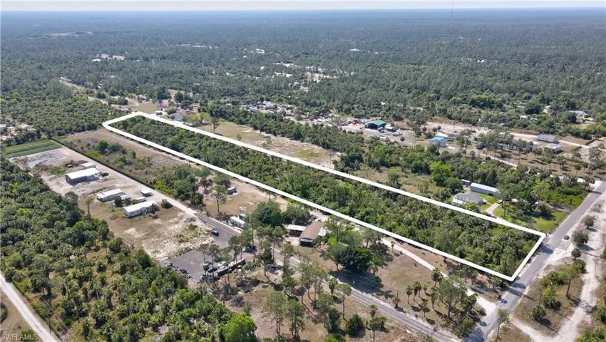 Drone / aerial view featuring a forest view
