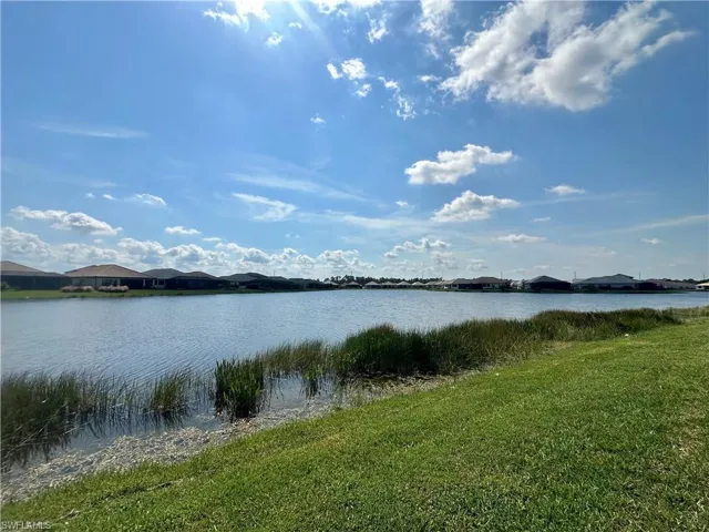Water view with nearby suburban area