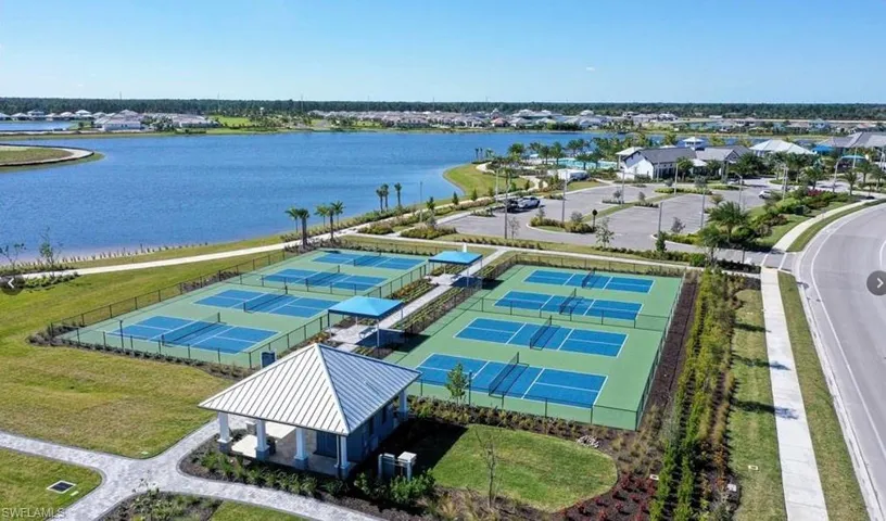Aerial view of residential area with a nearby body of water