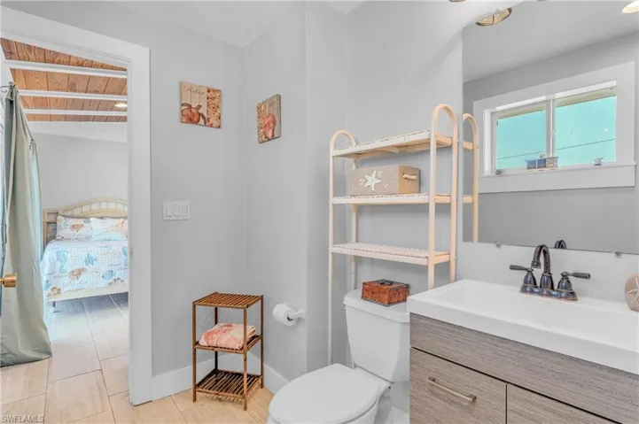 Bathroom featuring vanity and ensuite bath
