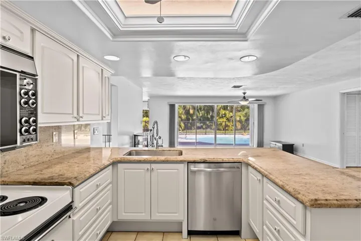 Kitchen featuring extensive counter space!  Perfect to gather around or entertain!