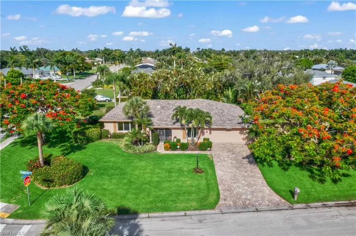 Aerial view of this sprawling corner lot!  Walk to Tanglewood elementary!