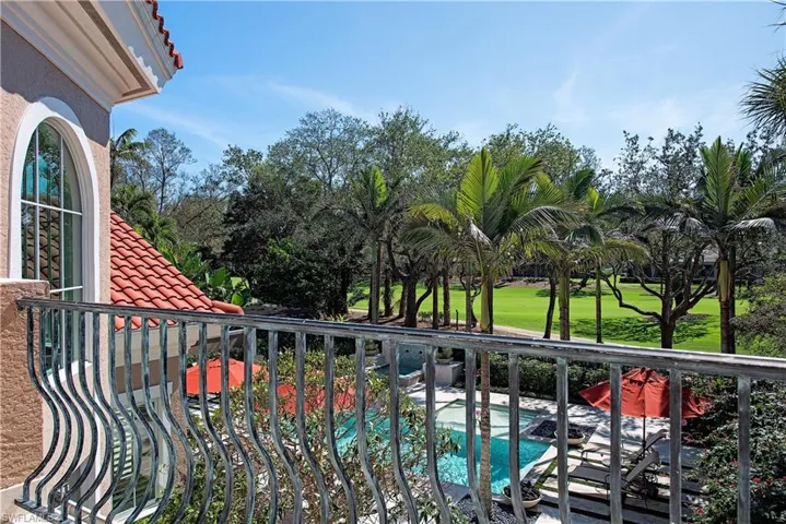 Balcony overlooking the pool area  with golf course views