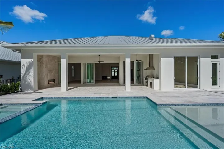 *4548 Seagrove is under construction. The finished home shown here is 23511 Coconut Landing Drive, an available move-in ready spec home with similar plan and features (223061312).