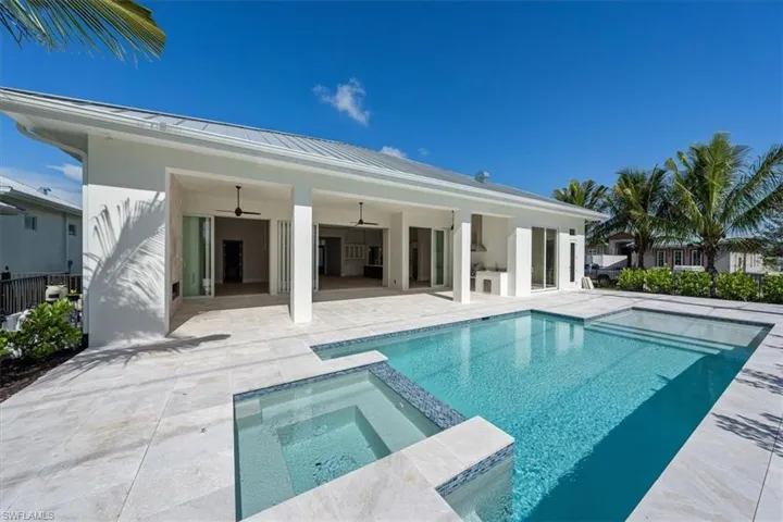 *4548 Seagrove is under construction. The finished home shown here is 23511 Coconut Landing Drive, an available move-in ready spec home with similar plan and features (223061312).