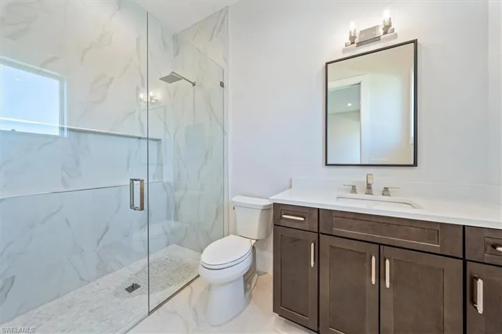*4548 Seagrove is under construction. The finished home shown here is 23511 Coconut Landing Drive, an available move-in ready spec home with similar plan and features (223061312).