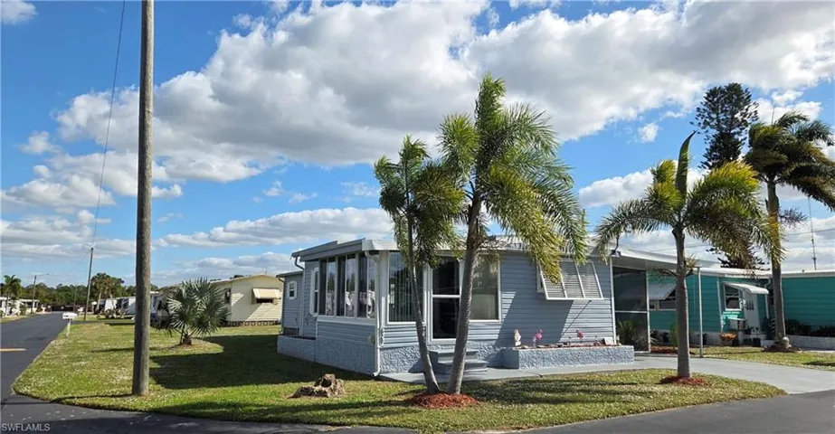 Ideally located  corner lot on a quiet street with no thru traffic, near the community swimming pool & well-kept amenities.
