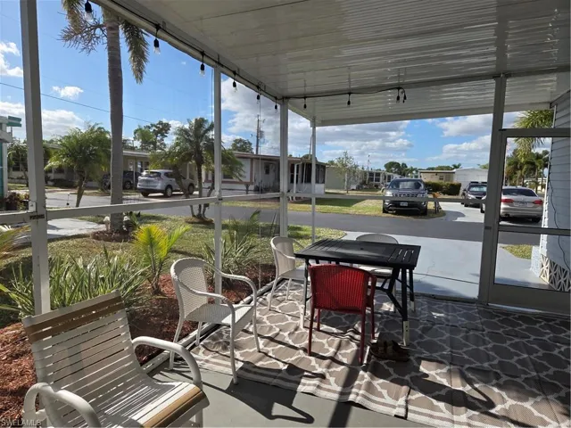 Screened breezeway and carport.