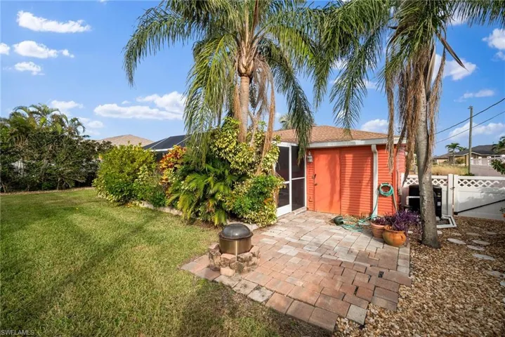 View of yard with a patio area