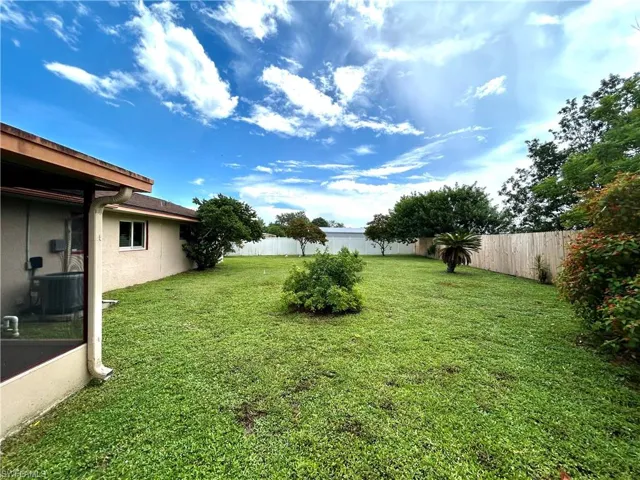 View of yard featuring central AC