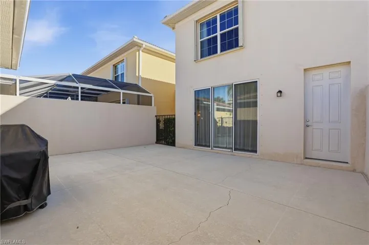 View of patio / terrace with a sunroom and area for grilling