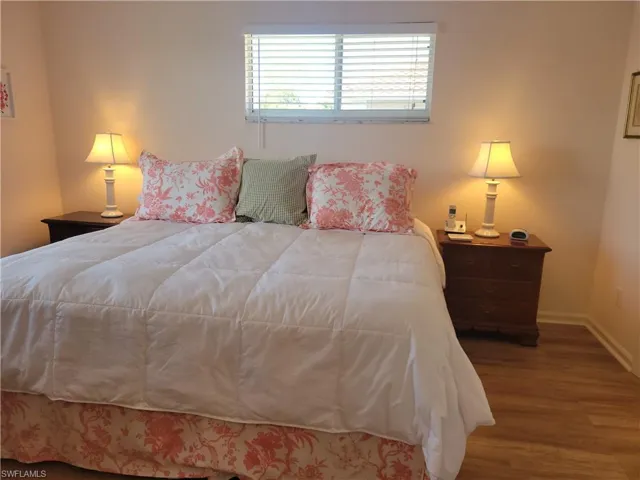 Easily holds king bed and 2 night stands