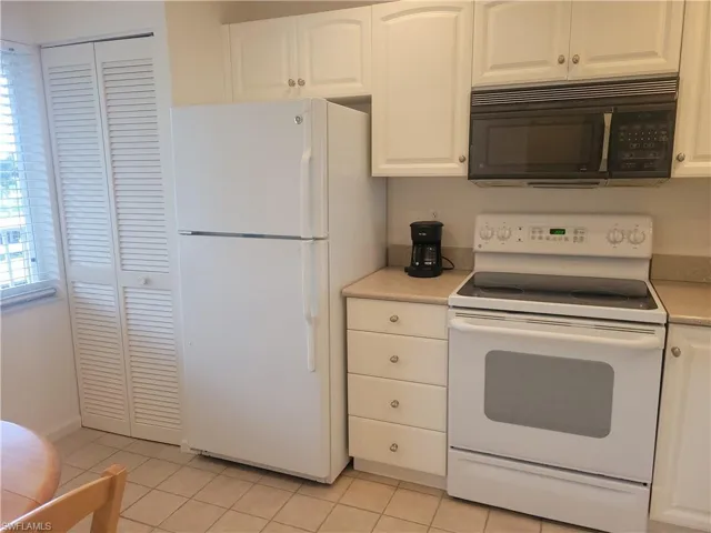 Lots of cabinets and a pantry too.