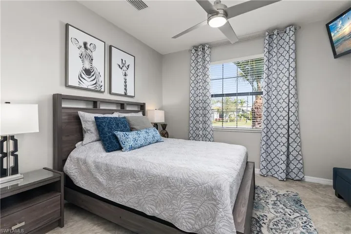Tile flooring, upgraded ceiling fan and TV.