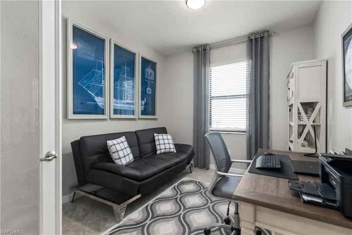 The den can be used as a home office, guest bedroom, exercise or hobby room.