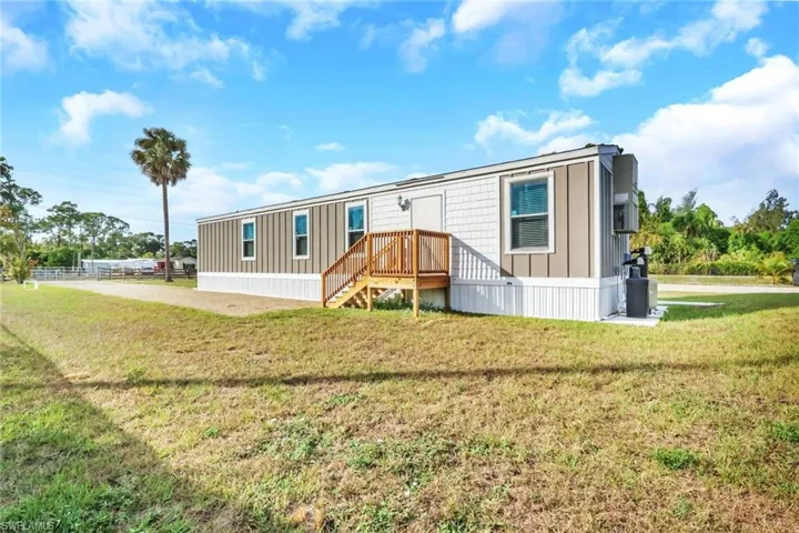 View of front of home with a front lawn