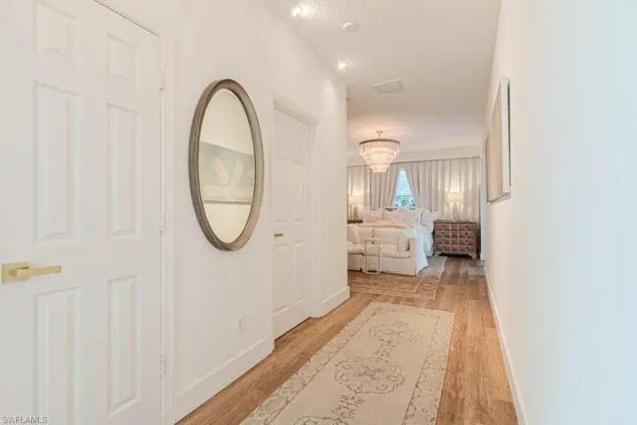 Beautiful hallway into Master Bedroom with walk in closet and linen closet.