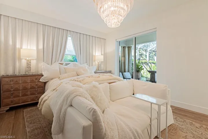 Wow!! Master Bedroom Sanctuary with sliding door to Garden Room.  Private sun shade