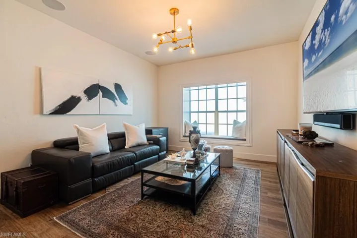 Third bedroom/den.  Closet in room.  Lovely sitting alcove