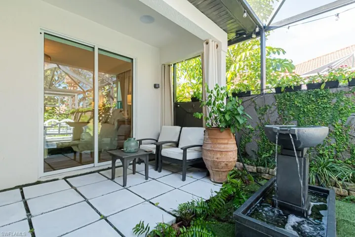 Part of the Garden Room next to the slider to the Primary Bedroom, open the door and enjoy the trickling fountain