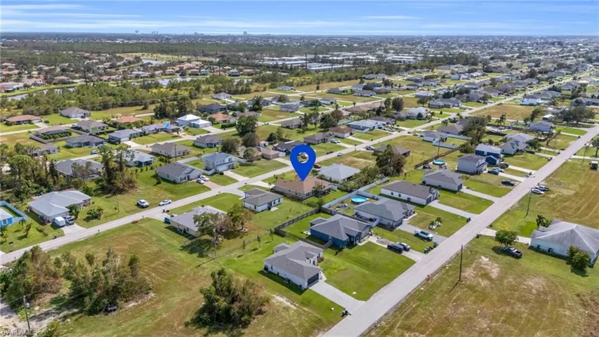 Birds eye view of property with a residential view