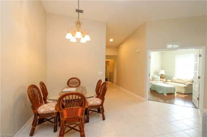 Dining area with an inviting chandelier