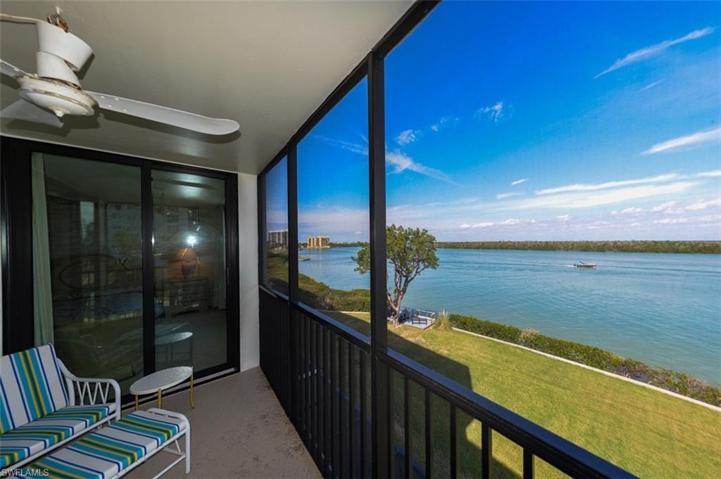 SPACIOUS NEWLY REFURBISHED LANAI.  ENTRANCE TO OWNER'S SUITE IS THROUGH IMPACT RESISTANT SLIDING DOORS TO LEFT.