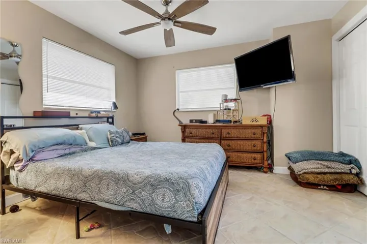 Bedroom featuring baseboards and a ceiling fan
