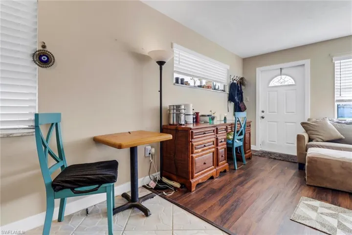 Entrance foyer featuring plenty of natural light and wood finished floors