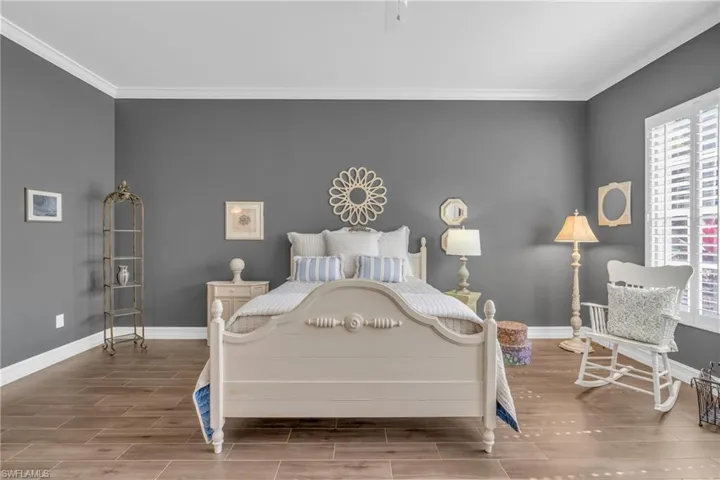 Bedroom with ornamental molding
