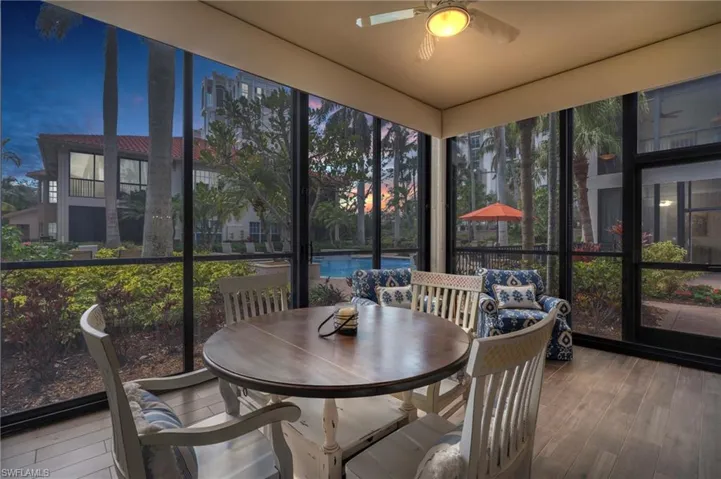 Sunroom featuring ceiling fan
