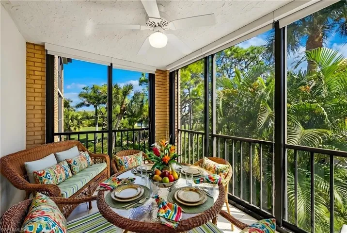 Sunroom / solarium with floor to ceiling windows
