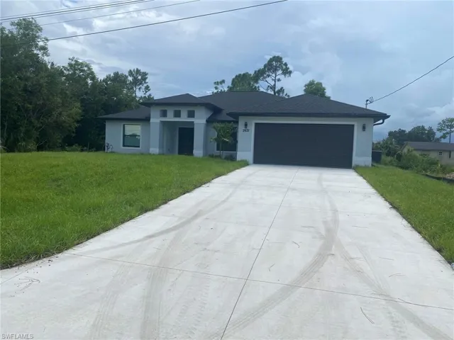 912  8th  AVE, Lehigh Acres, FL 33972