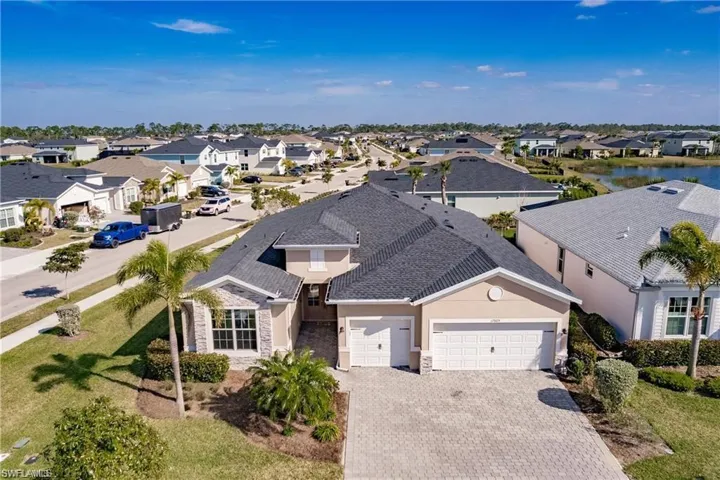 Corner, 3 car-garage, fenced backyard & more