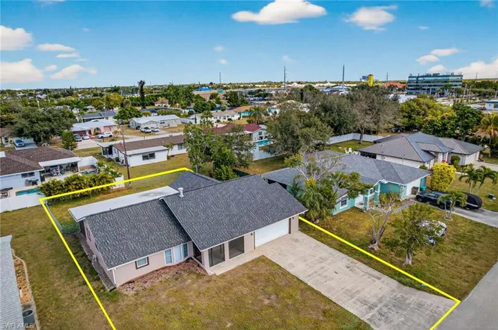 Aerial perspective of suburban area with property boundaries highlighted