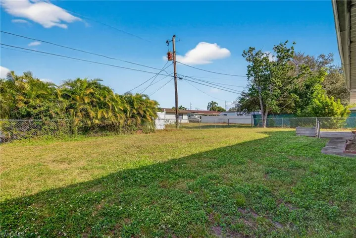 View of fenced backyard