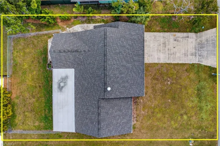 Aerial overview of property's location featuring property parcel outlined