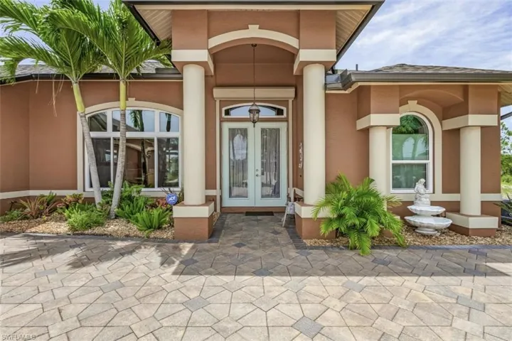Doorway to property featuring french doors