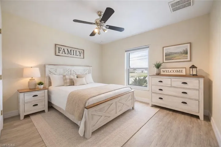 Bedroom featuring ceiling fan and light wood-style flooring